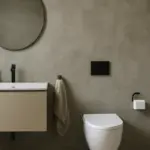Parete effetto cemento spatolato in bagno: la tecnica per ambienti contemporanei e facili da pulire